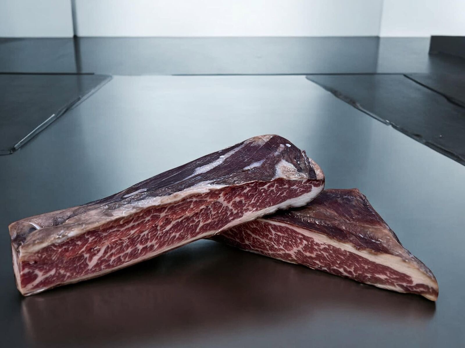 Aged beef resting on genuine 304 food-grade stainless